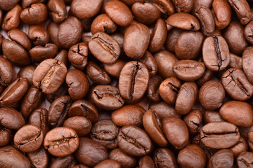 Roasted coffee beans, can be used as a background.