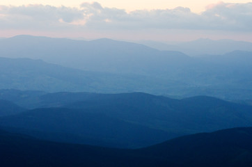Obraz premium Photo of the mountains after sunset.