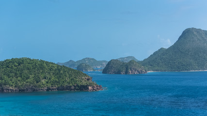 Guadeloupe, beautiful seascape of the Saintes islands, typical houses and sailboats in the marina
