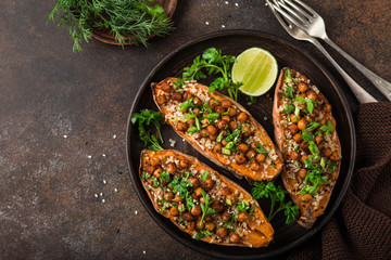 sweet potato stuffed with chickpeas and quinoa.