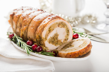 stuffed turkey breast roll. White background