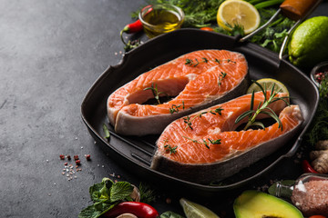 Fresh raw salmon steaks on grill pan  ready for cooking