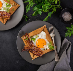 crepe with fried egg and bacon for breakfast
