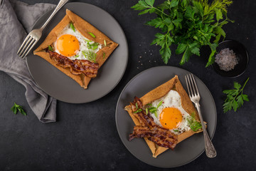 crepe with fried egg and bacon for breakfast