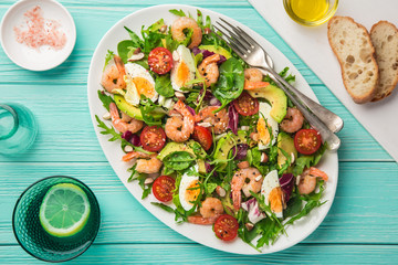avocado, tomato, eggs and shrimps salad