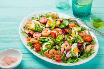 avocado, tomato, eggs and shrimps salad