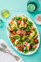 avocado, tomato, eggs and shrimps salad