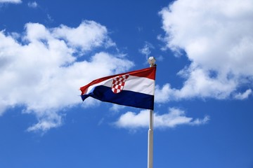 croatian flag in the wind against a blue sky
