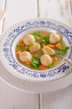 Fresh vegetable soup with chicken dumplings