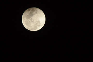 Fototapeta premium Full supermoon in Bangalore on January 31st 2018 - Top left