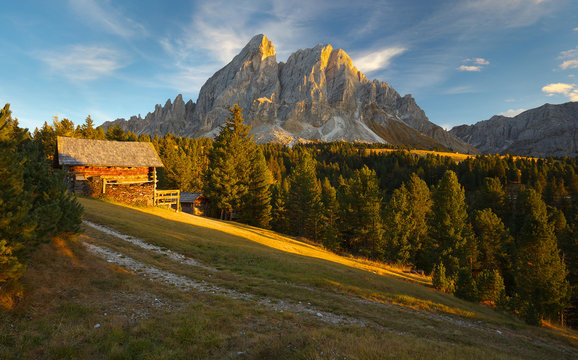 Small hut with a mountain on background, Dolomites, Italy