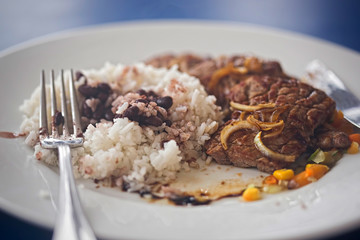 Beef with rice and beans, vegetables. Cuban dish