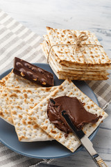 Matzah bread with chocolate cream and knife