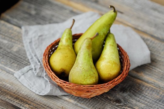 Fresh ripe green pears on the table 