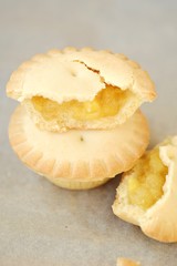 Delicious muffins with pineapples on the table 