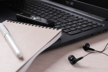 journalist's work at a computer with a voice recorder