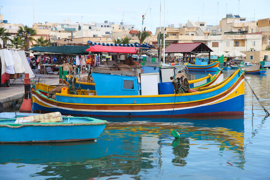 Colourful maltese boats in Marsaxlokk Harbor