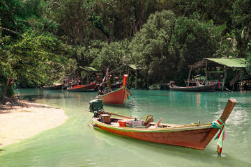 Fototapeta na wymiar Boats near the fishing village in Thailand