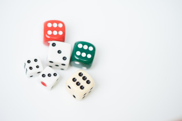 .Top view of Colorful Rolling the dice concept for business risk, chance, good luck or gambling.white background.