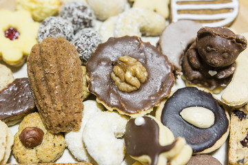 Several types of sugar on a plate.