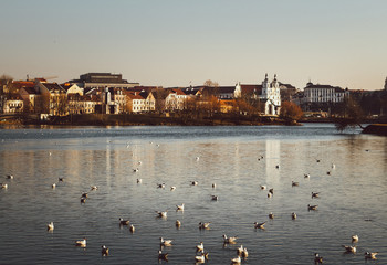 Naklejka premium View of Trinity Suburb and River, Minsk. Autumn in Belarus