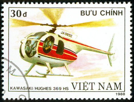 Ukraine - circa 2018: A postage stamp printed in Vietnam show Japanese multipurpose helicopter Mbb Bo 105. Circa 1988.