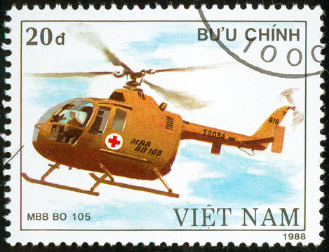 Ukraine - circa 2018: A postage stamp printed in Vietnam show German multipurpose and attack helicopter Mbb Bo 105. Circa 1988.