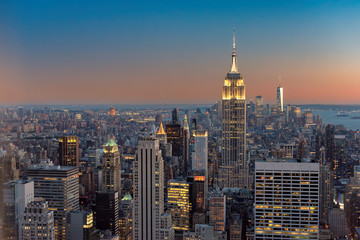 Fototapeta na wymiar New York City skyline with urban skyscrapers at sunset, NY, USA.