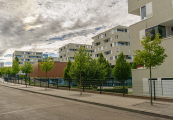 New apartment buildings in an urban German city,shot from a public place