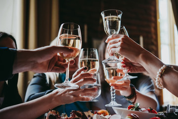 People raising glasses