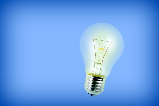 Light bulb on blue background.