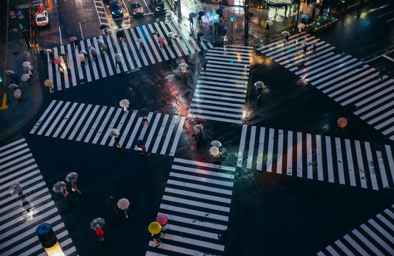 Crossing in Tokyo. Aerial view of people crossing the street