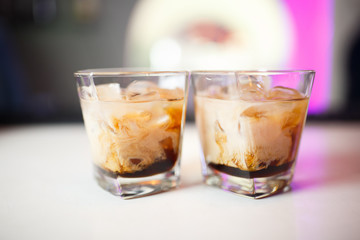Two cocktails at the bar.