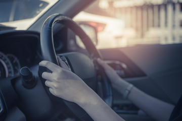 young women driving a car