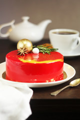 tasty red cake wth cup of tea on birthday