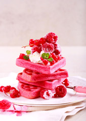 Red velvet waffles with berries