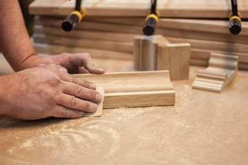 Work carpenter in the carpenter's workshop. A close-up of the tool. For woodworking