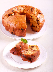 Date and orange ring cake, served