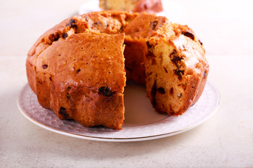 Date and orange ring cake, served