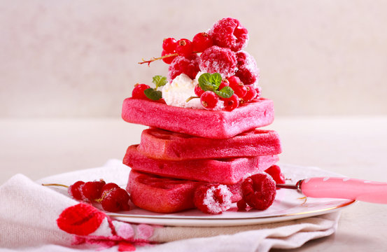 Red velvet waffles with berries