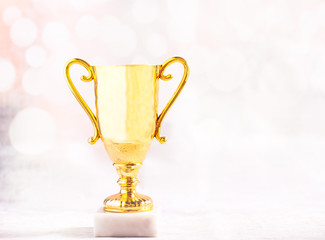 Golden trophy over bokeh