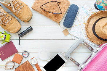 Overhead top view, flat lay, Men's accessories and essential travel items with space on white wooden board background