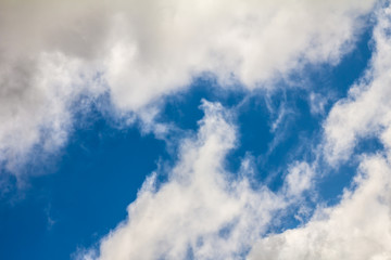 Bright blue sky and white clouds in clear weather appropriate for background