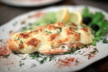 Salmon steak with suluguni cheese