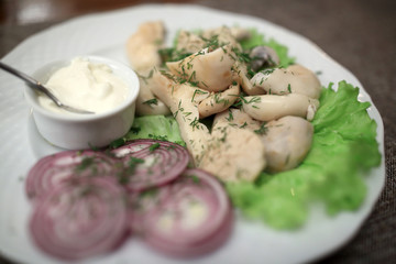 Salted pickled mushrooms with onions
