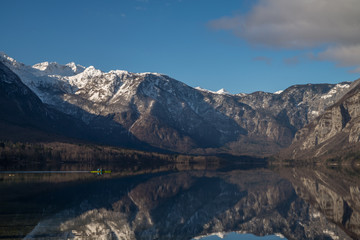 Scenic Bohinj lake with its surrounding nature in Slovenia