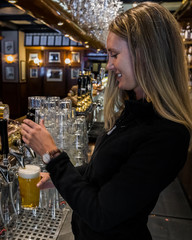 Bartender tap a beer