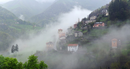 Fototapeta premium Alpine village in cloudy weather