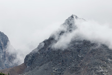 mount peak in a clouds and fog