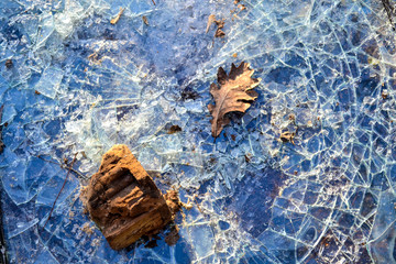 Broken glass. The glass was smashed.